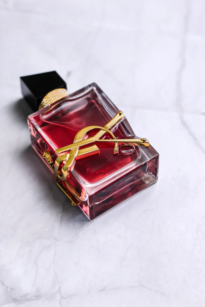 Close-up of the red YSL Libre Berry Crush perfume bottle