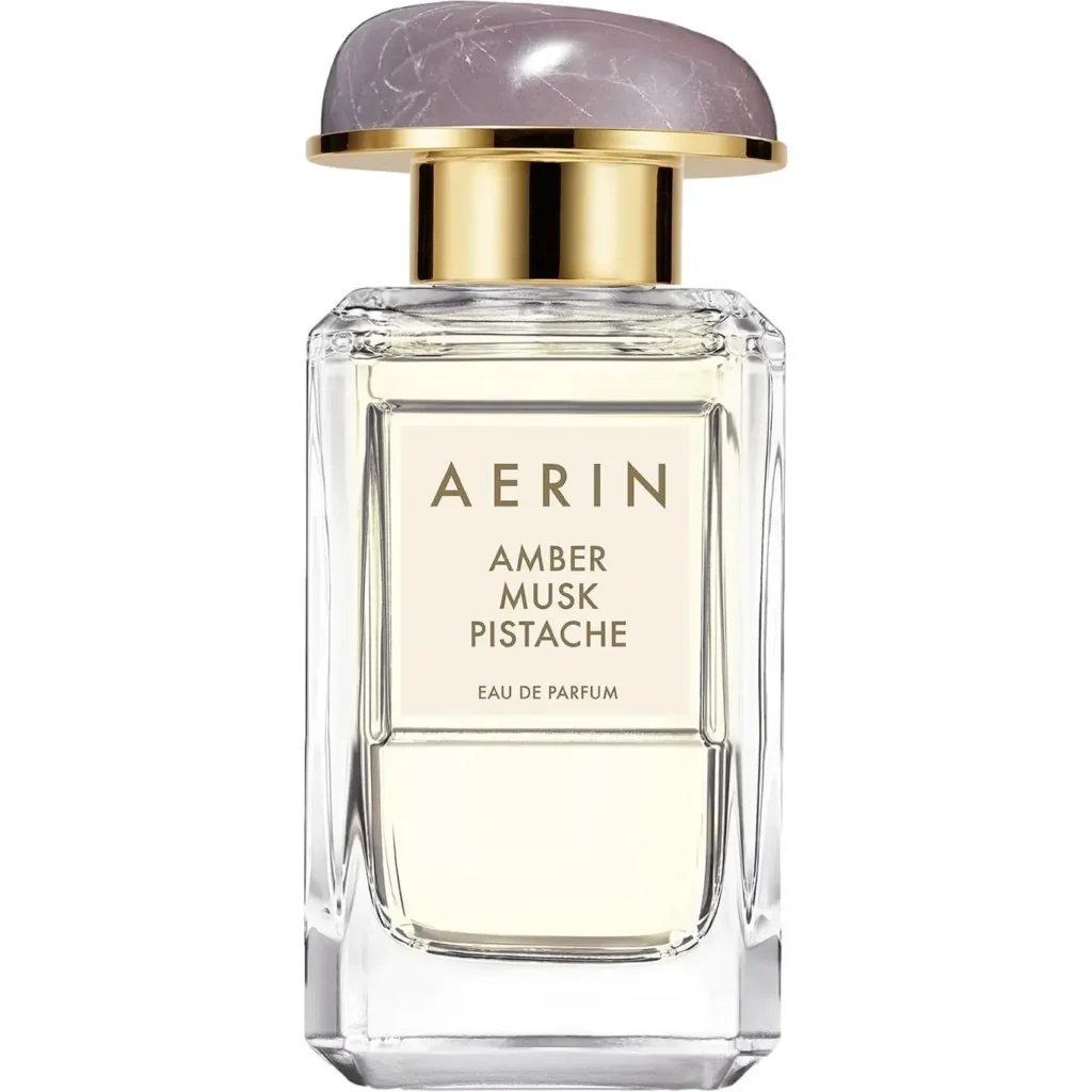 AERIN Amber Musk Pistache Eau de Parfum bottle with purple stone cap
