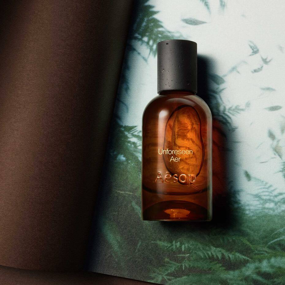 Detail of the basalt-inspired textured cap on the Aesop Unforeseen Aer bottle