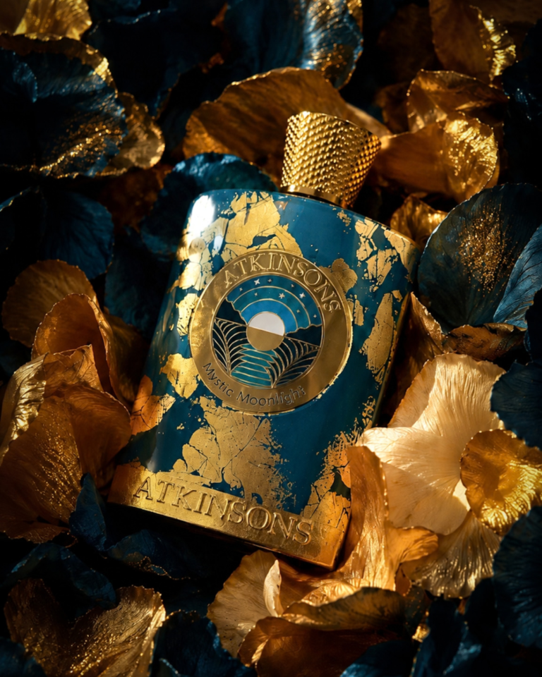 Atkinsons Mystic Moonlight review, Parfum Intense bottle surrounded by blue and gold petals