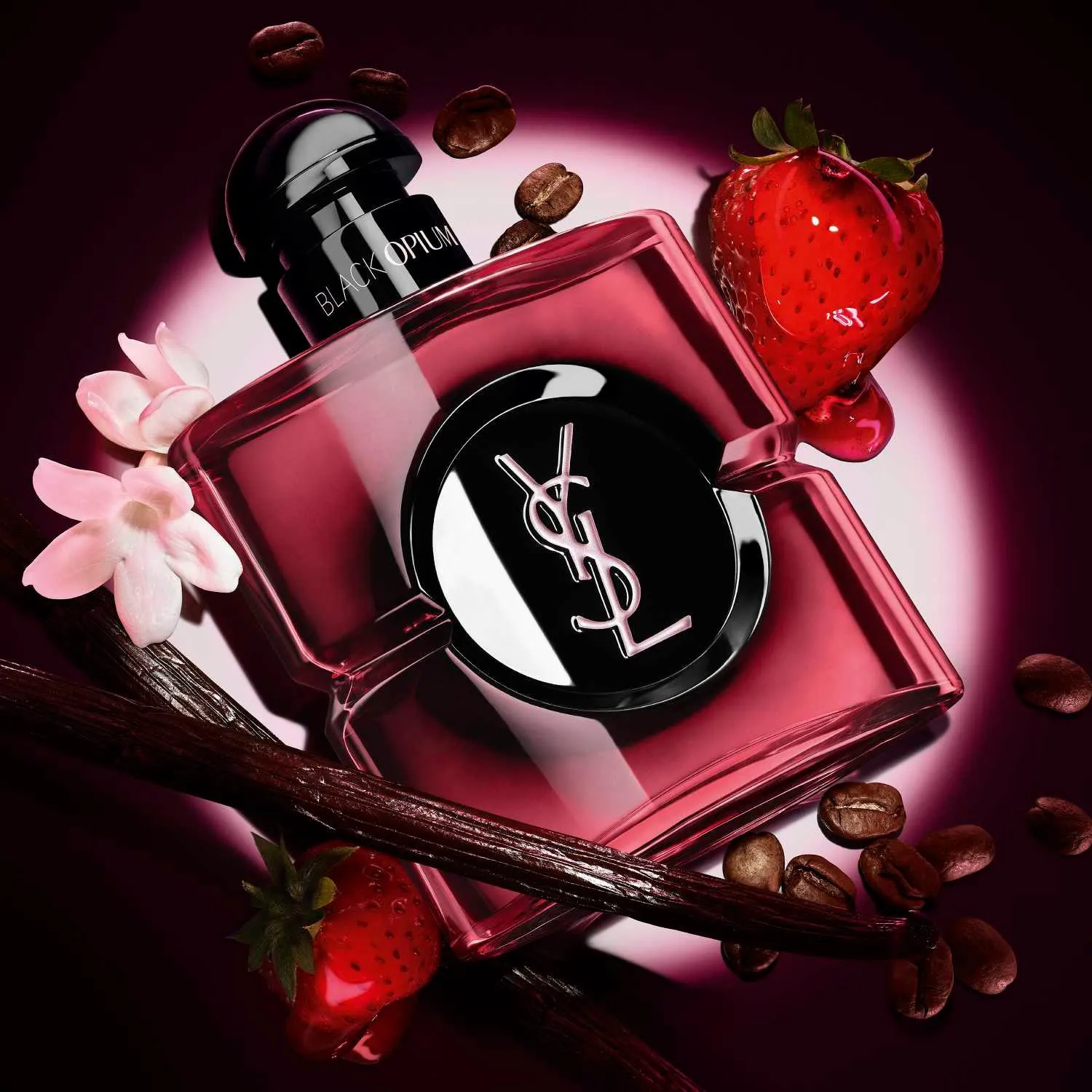 YSL Black Opium Pink Glaze perfume bottle with strawberries, coffee beans, jasmine and vanilla