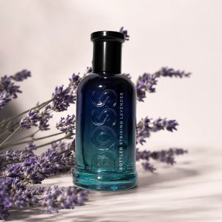 BOSS Bottled Striking Lavender bottle surrounded by lavender flowers