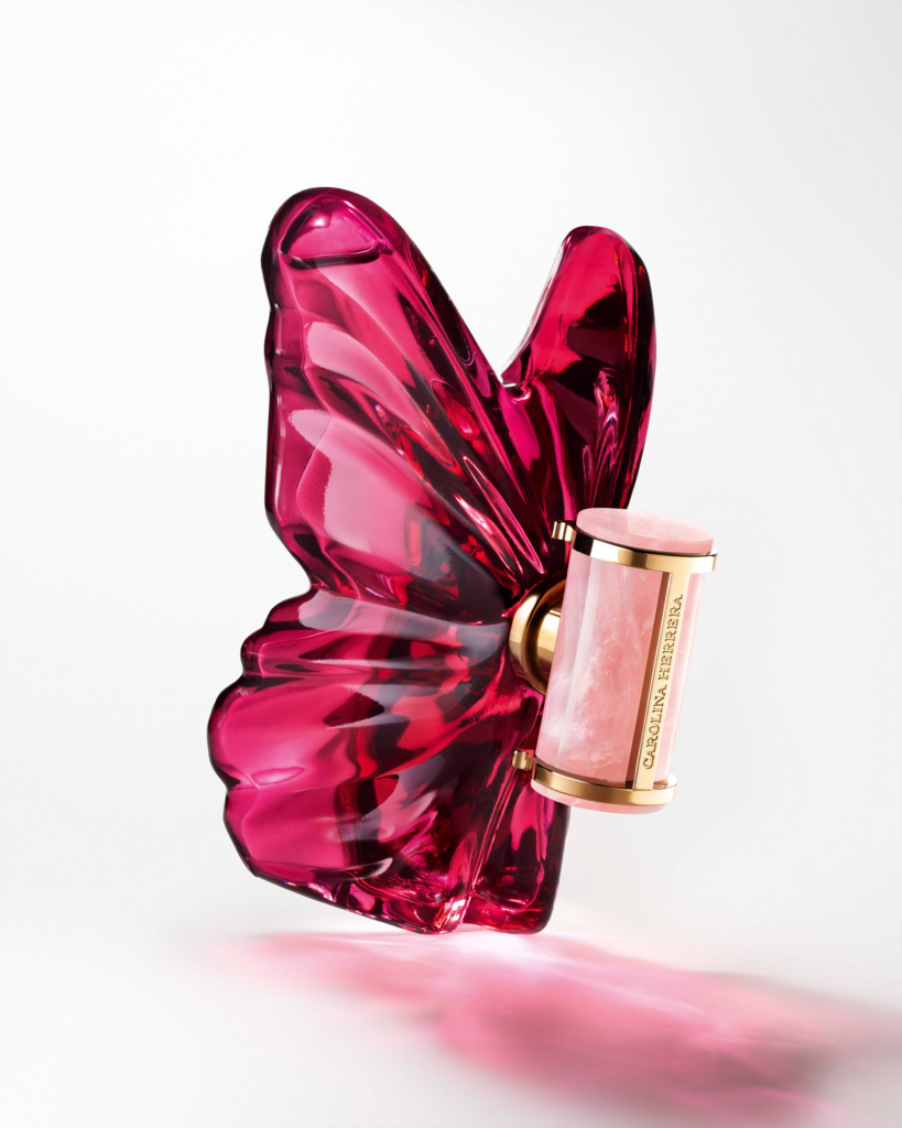 Carolina Herrera La Bomba Eau de Parfum pink butterfly-shaped glass bottle on white background
