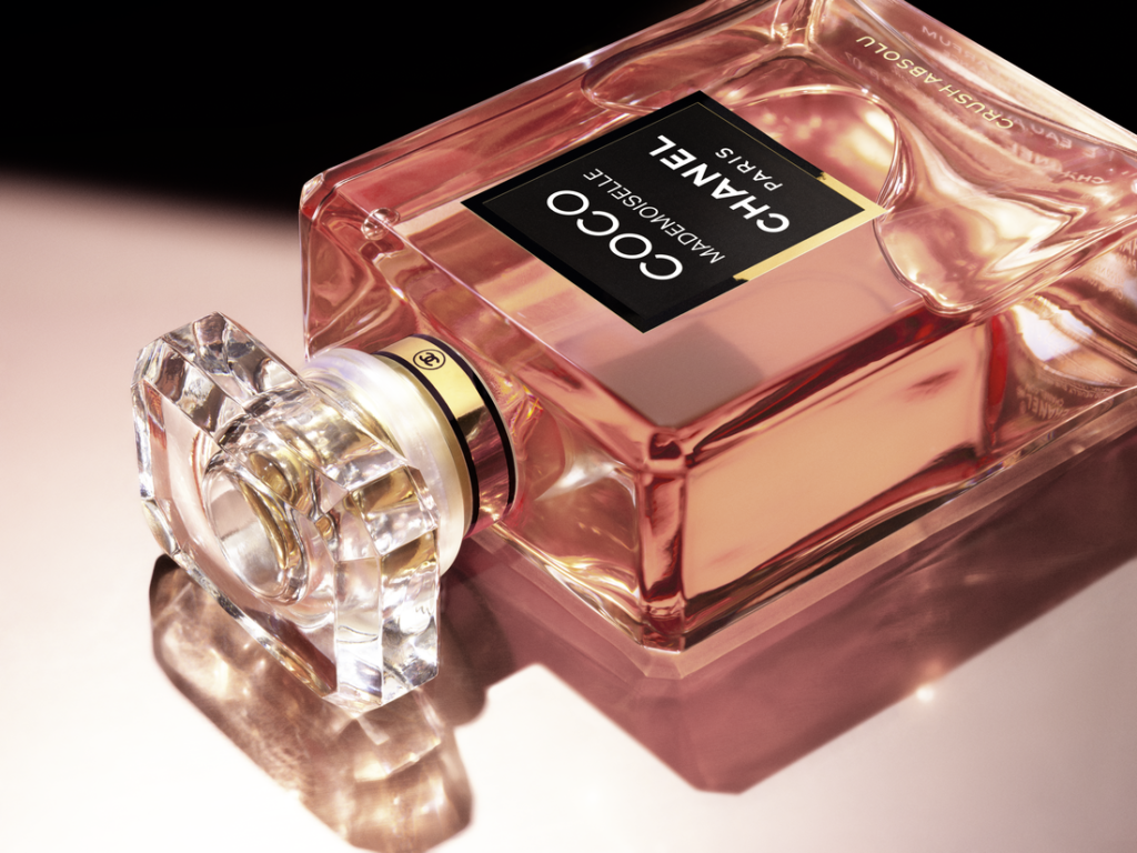 Coco Mademoiselle Crush Absolu perfume bottle photographed in warm light