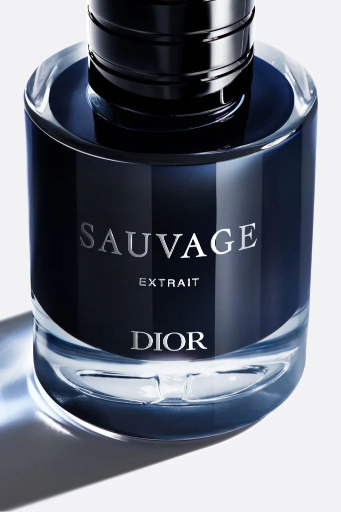 Close view of the Dior Sauvage Extrait bottle label and dark blue glass