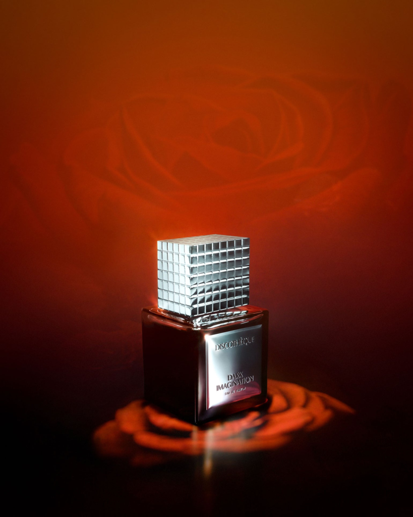 Discothèque Dark Imagination perfume in orange light