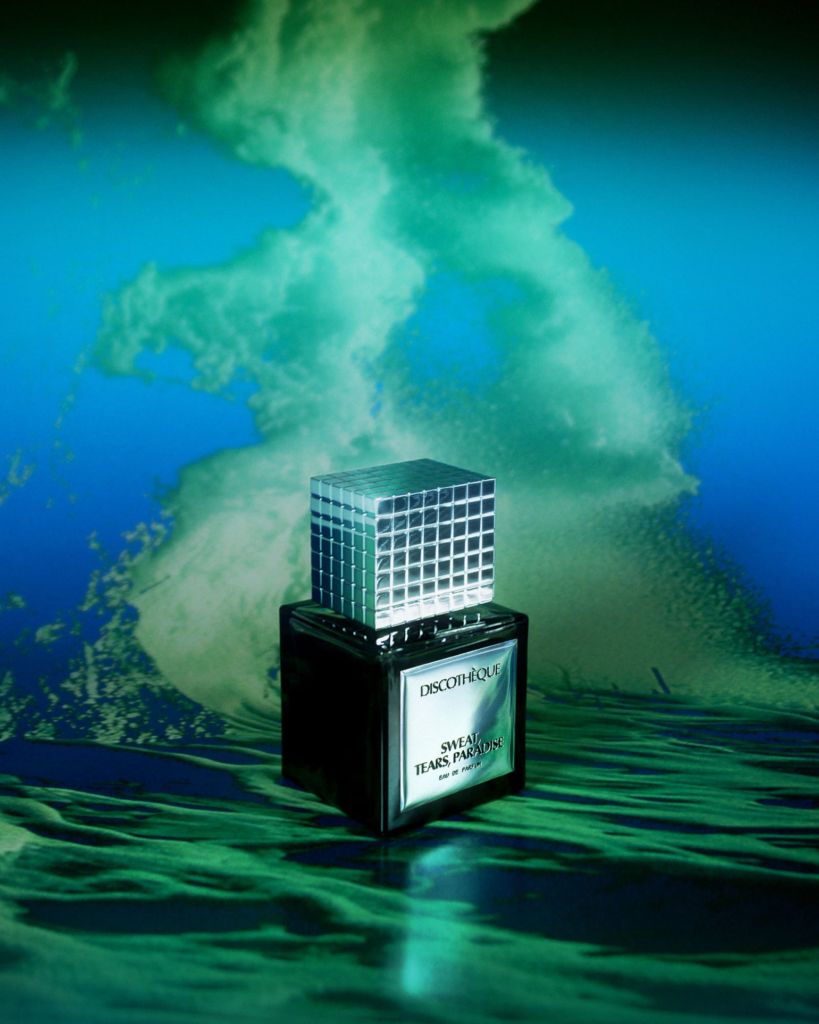 Discothèque Sweat Tears Paradise perfume in blue-green light