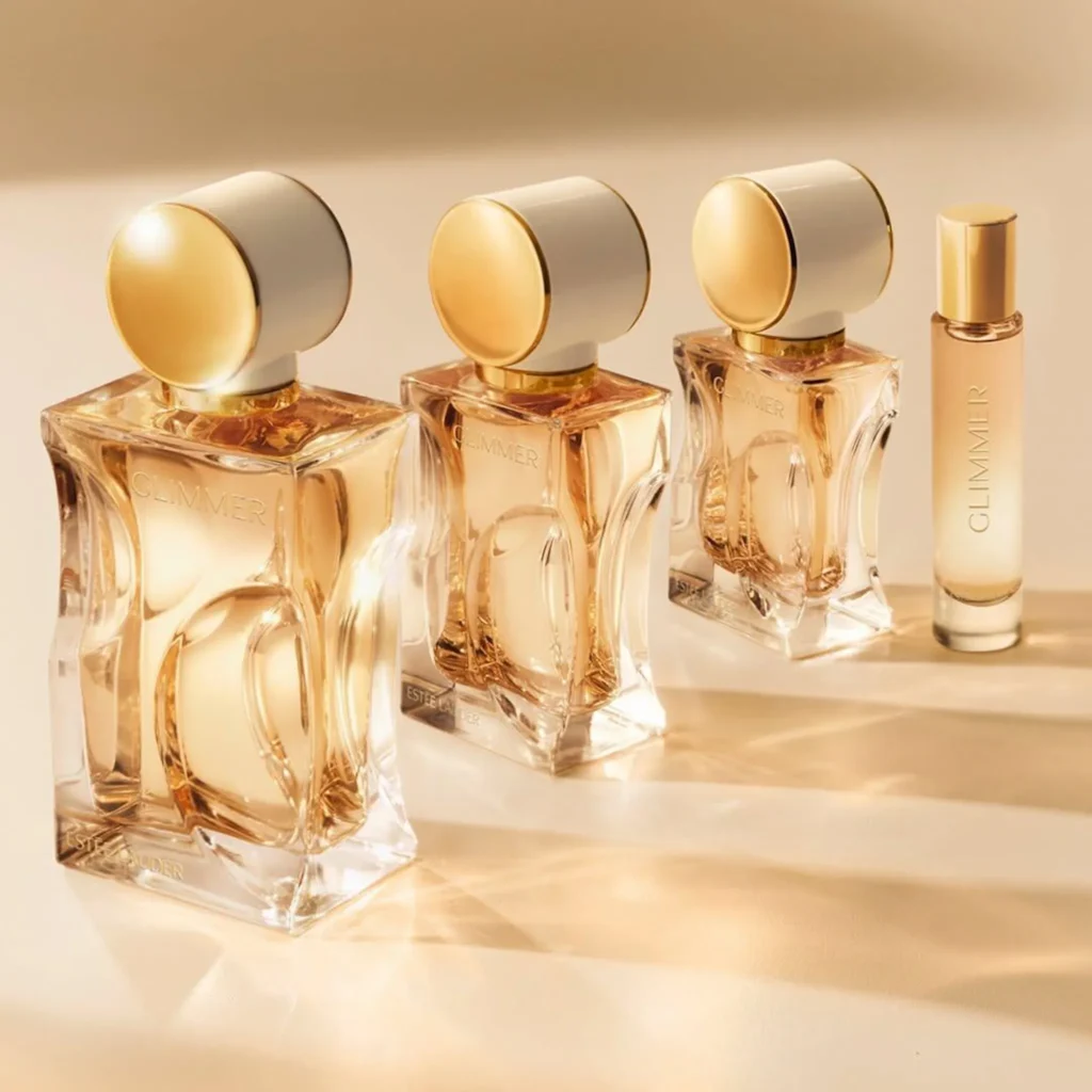 Estée Lauder Glimmer perfume bottles in several sizes with matching travel spray