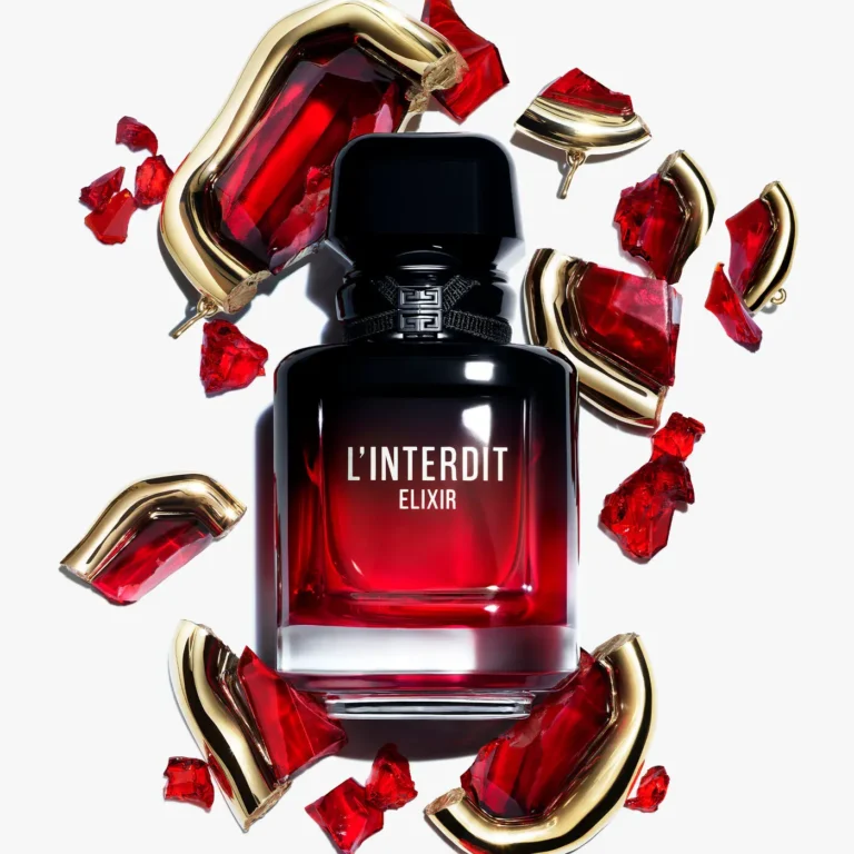Givenchy L’Interdit Elixir 2026 bottle surrounded by broken ruby pieces