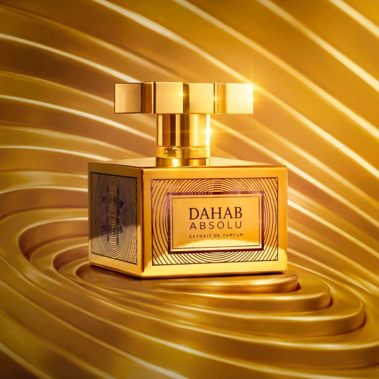 Kajal Dahab Absolu bottle on gold swirl background