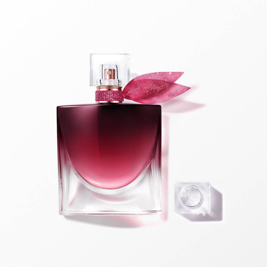 Lancôme La Vie Est Belle Very Cherry perfume bottle with pink glitter bow on white background