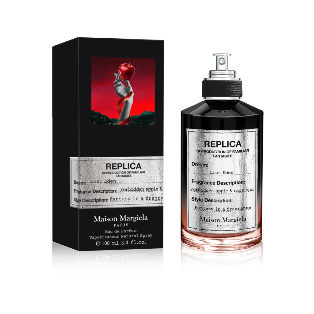 Maison Margiela Replica Lost Eden Eau de Parfum bottle and black box on a white background