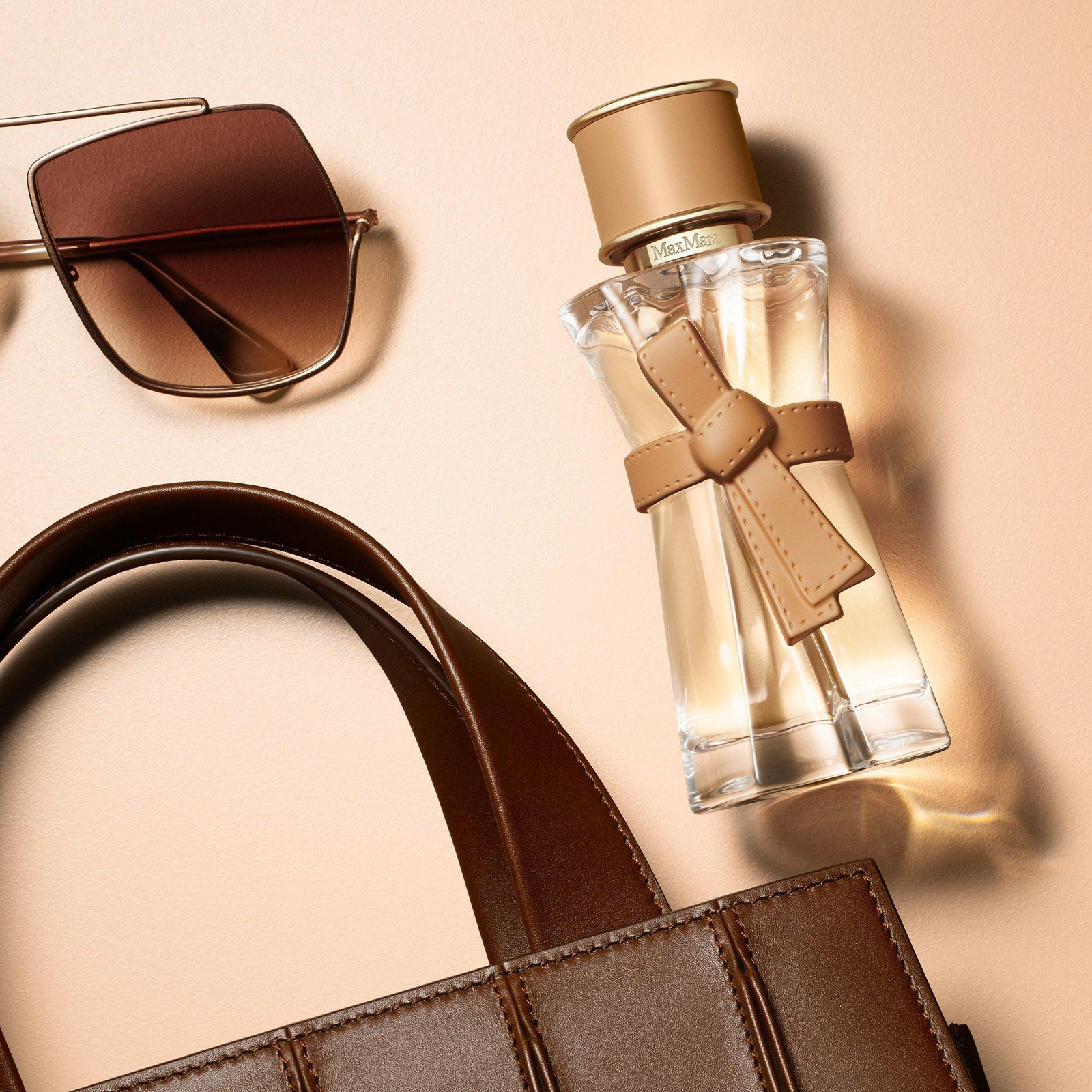 Max Mara Le Parfum bottle with camel leather accessories