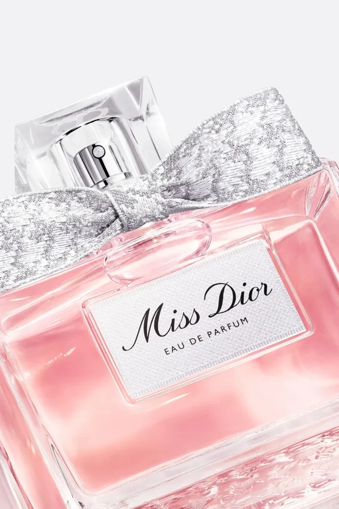 Close detail of the Miss Dior Eau de Parfum 2026 bottle and silver bow