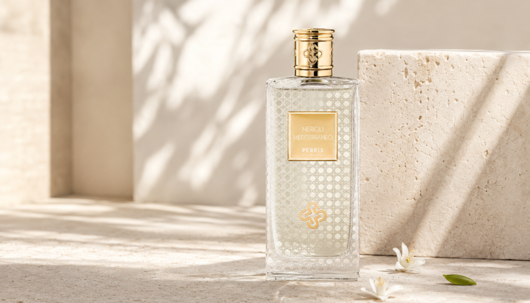 Perris Monte Carlo Neroli Mediterraneo perfume bottle in a sunlit Mediterranean setting