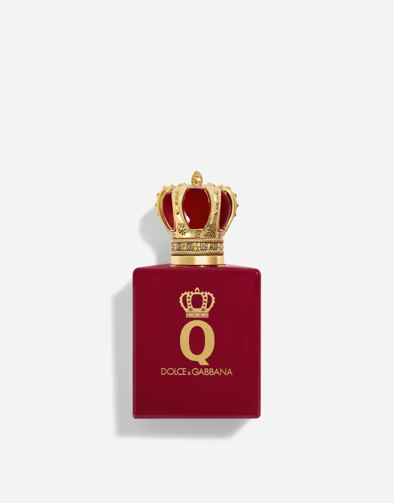 Deep red Q by Dolce&Gabbana Elixir perfume bottle with gold crown cap