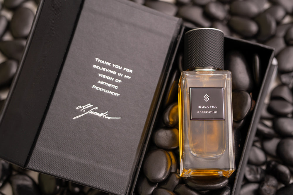 Sorrentino Perfumes Isola Mia bottle displayed inside its black presentation box