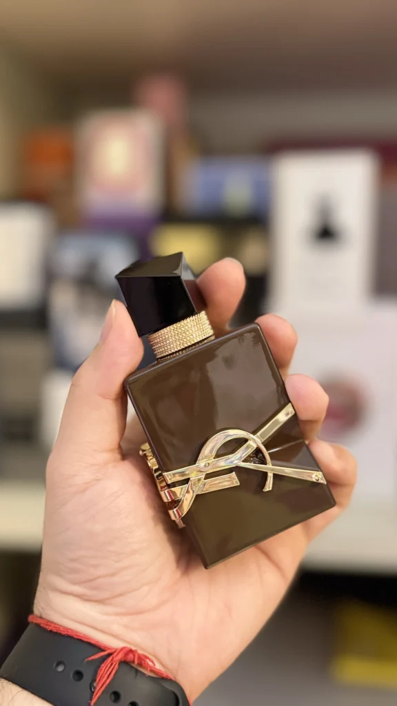YSL Libre Santal Couture bottle held in hand for an independently tested review