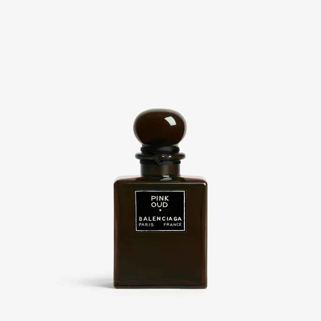 Balenciaga Pink Oud Extrait de Parfum bottle with a rounded dark cap against a light background