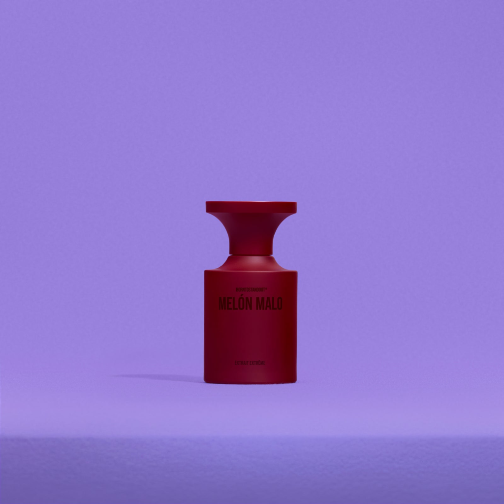 Red Melon Malo perfume bottle on a purple background