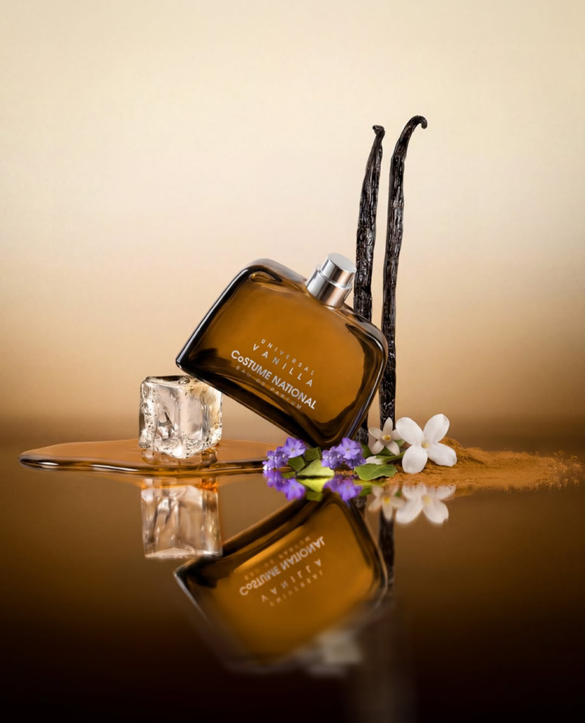 Costume National Universal Vanilla bottle with vanilla pods, flowers and ice