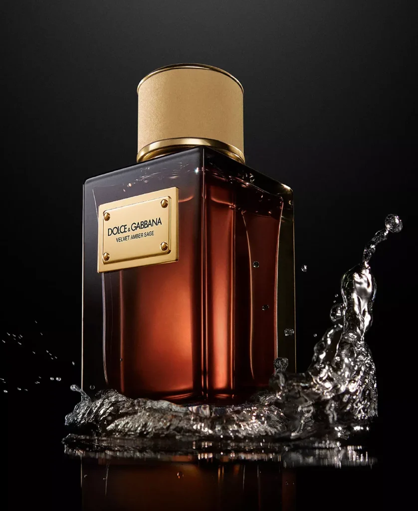 Dolce&Gabbana Velvet Amber Sage bottle with splashing water on a black background