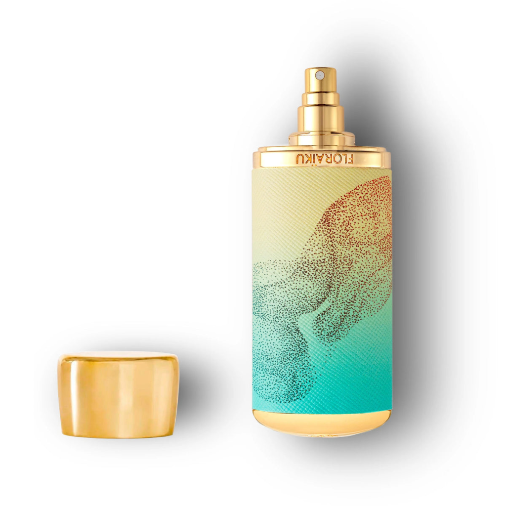 Floraïku Birdwatcher travel spray with a turquoise, cream and gold decorated case