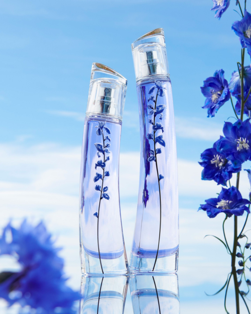 Flower by Kenzo Ikebana Indigo perfume bottles surrounded by blue flowers