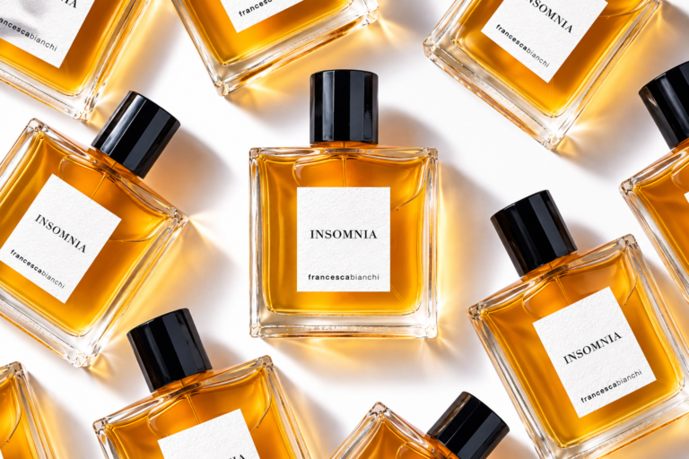 Francesca Bianchi Insomnia Extrait de Parfum bottles arranged in an editorial pattern