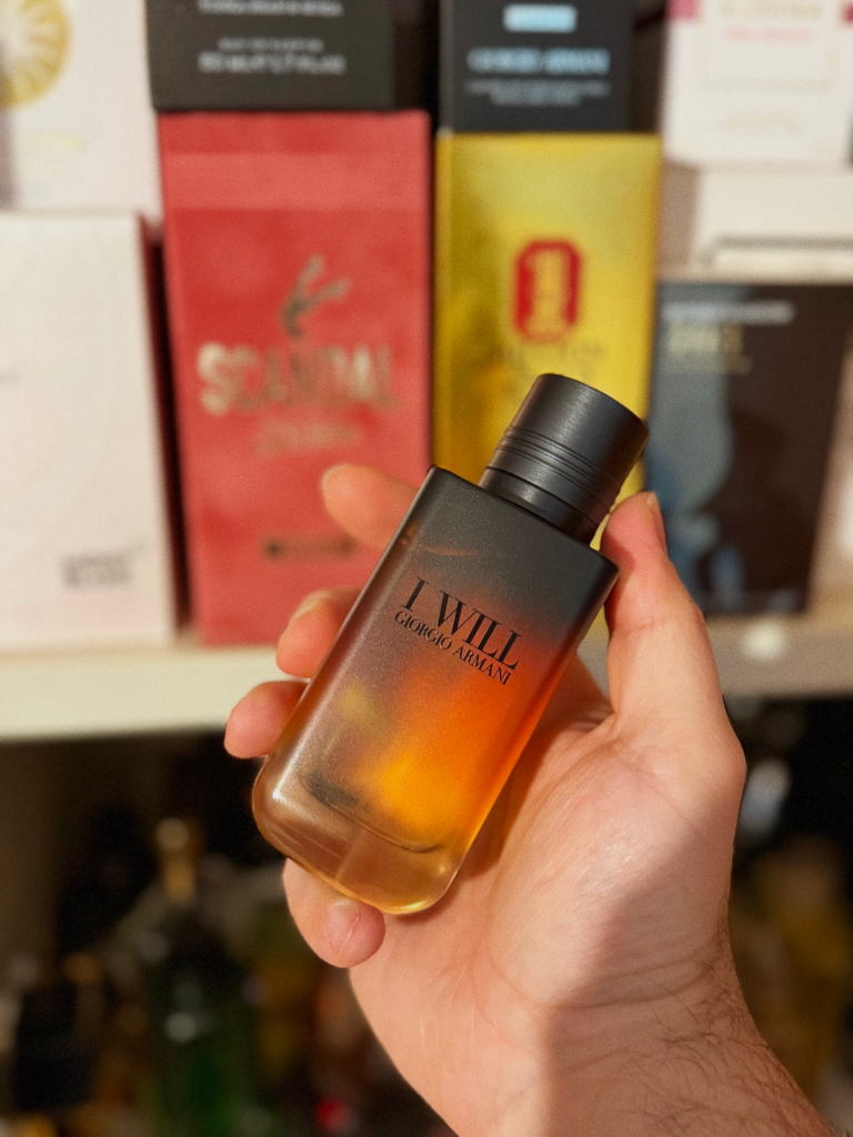 Giorgio Armani I WILL Eau de Parfum bottle held in hand