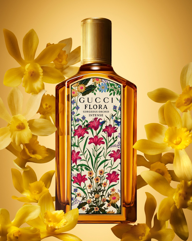 Gucci Flora Gorgeous Orchid Intense bottle framed by yellow vanilla orchid flowers