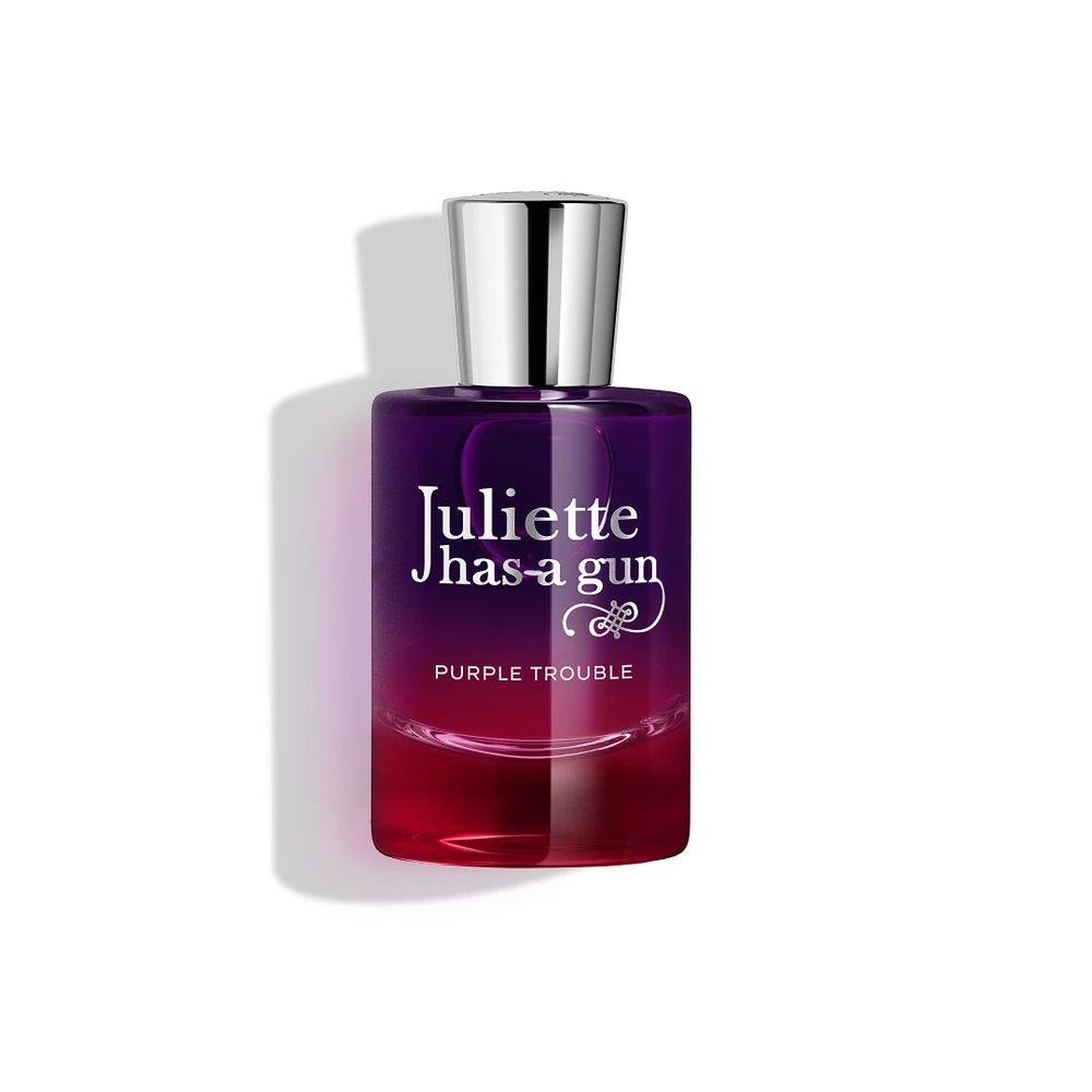 Front view of the Juliette Has a Gun Purple Trouble 50 ml bottle with a purple-to-red glass gradient