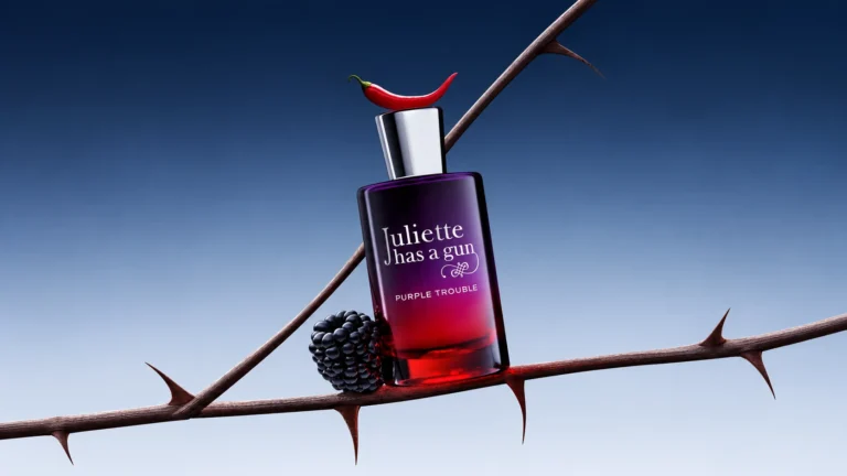 Juliette Has a Gun Purple Trouble bottle with a red chilli pepper, blackberry and thorny branches