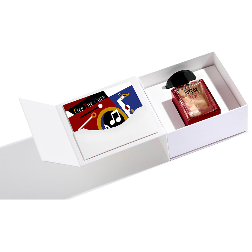 JUSBOX Off the Cuff perfume presented inside its open packaging