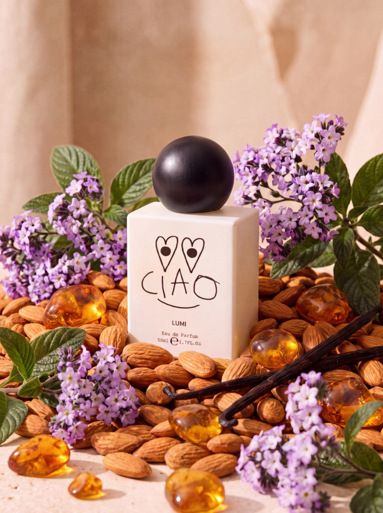 LUMI CIAO perfume surrounded by almonds, heliotrope, vanilla pods and amber-colored resin
