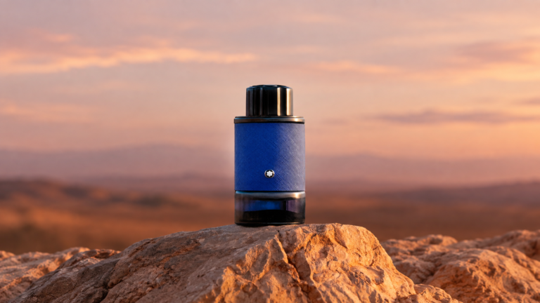 Montblanc Explorer Infinite bottle on a rocky landscape at sunset