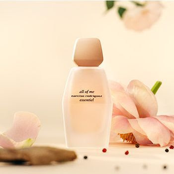 Close-up of the Narciso Rodriguez All of Me Essentiel bottle with peony and black peppercorns