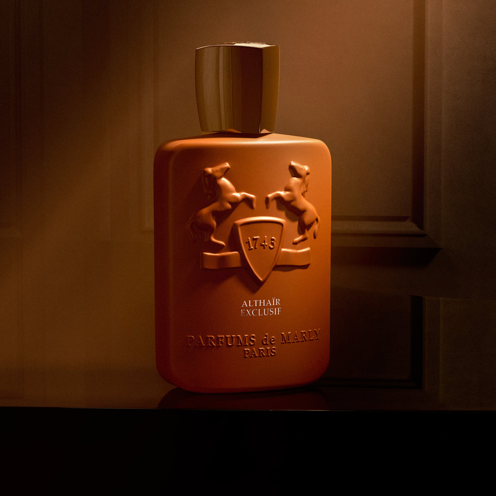Parfums de Marly Althaïr Exclusif bottle in warm amber light