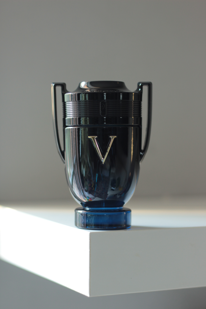 Rabanne Invictus perfume bottle designed in the shape of a trophy
