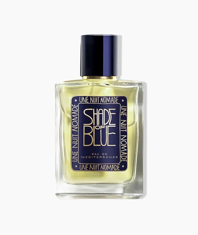 Une Nuit Nomade Shade of Blue perfume bottle on a white background