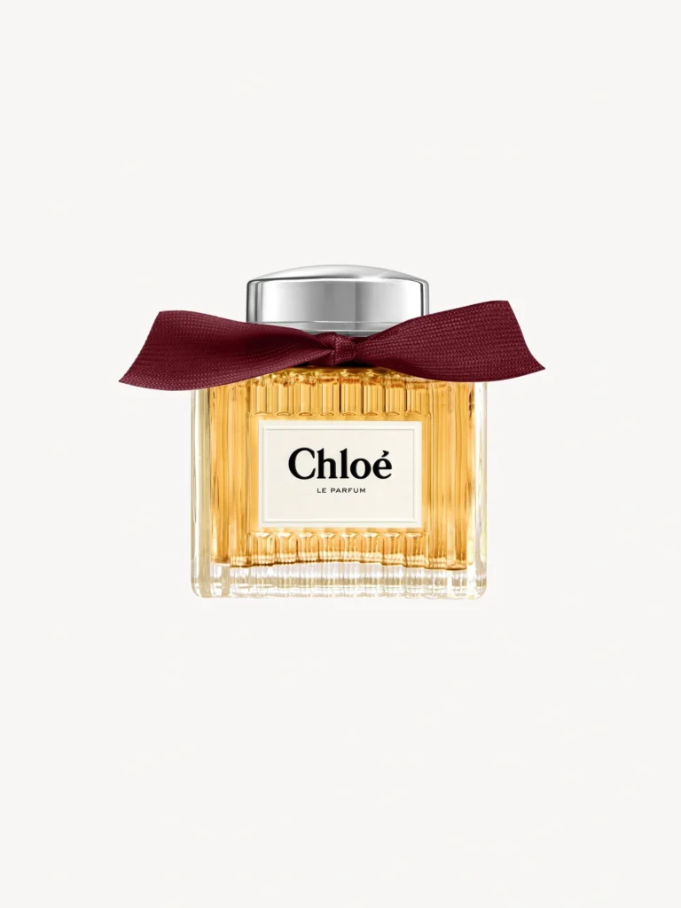 Chloé Le Parfum perfume bottle with golden liquid and burgundy ribbon