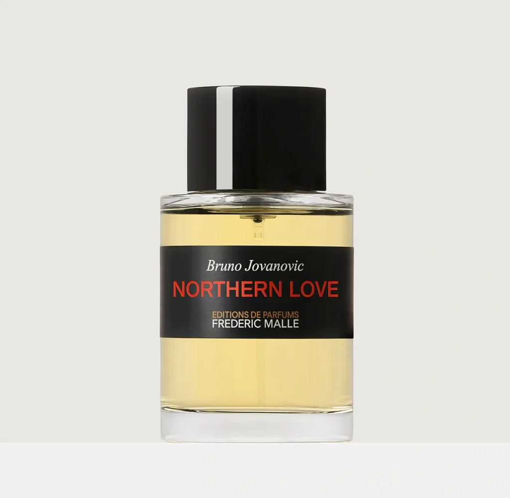 Frédéric Malle Northern Love Eau de Parfum bottle with black cap, golden liquid and black label featuring Bruno Jovanovic's name.