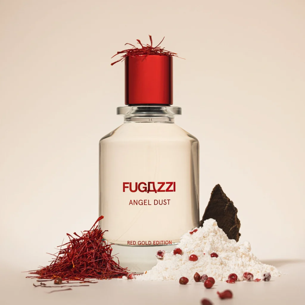 Fugazzi Angel Dust Red Gold Edition perfume bottle with red cap, saffron and pink peppercorns