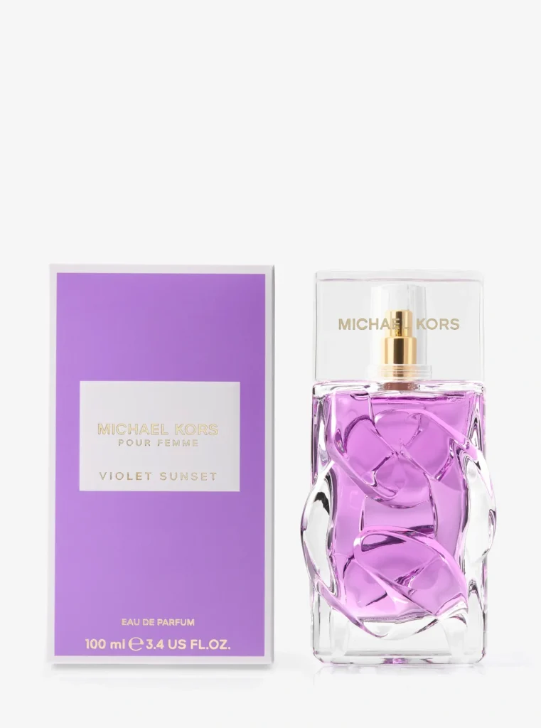 Michael Kors Pour Femme Violet Sunset Eau de Parfum presented alongside its lilac-purple packaging.