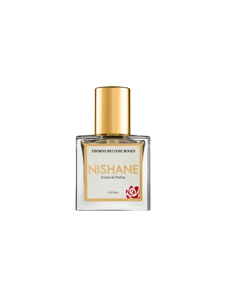 Nishane Thorns Become Roses 15 ml bottle with a cylindrical gold cap on a white background