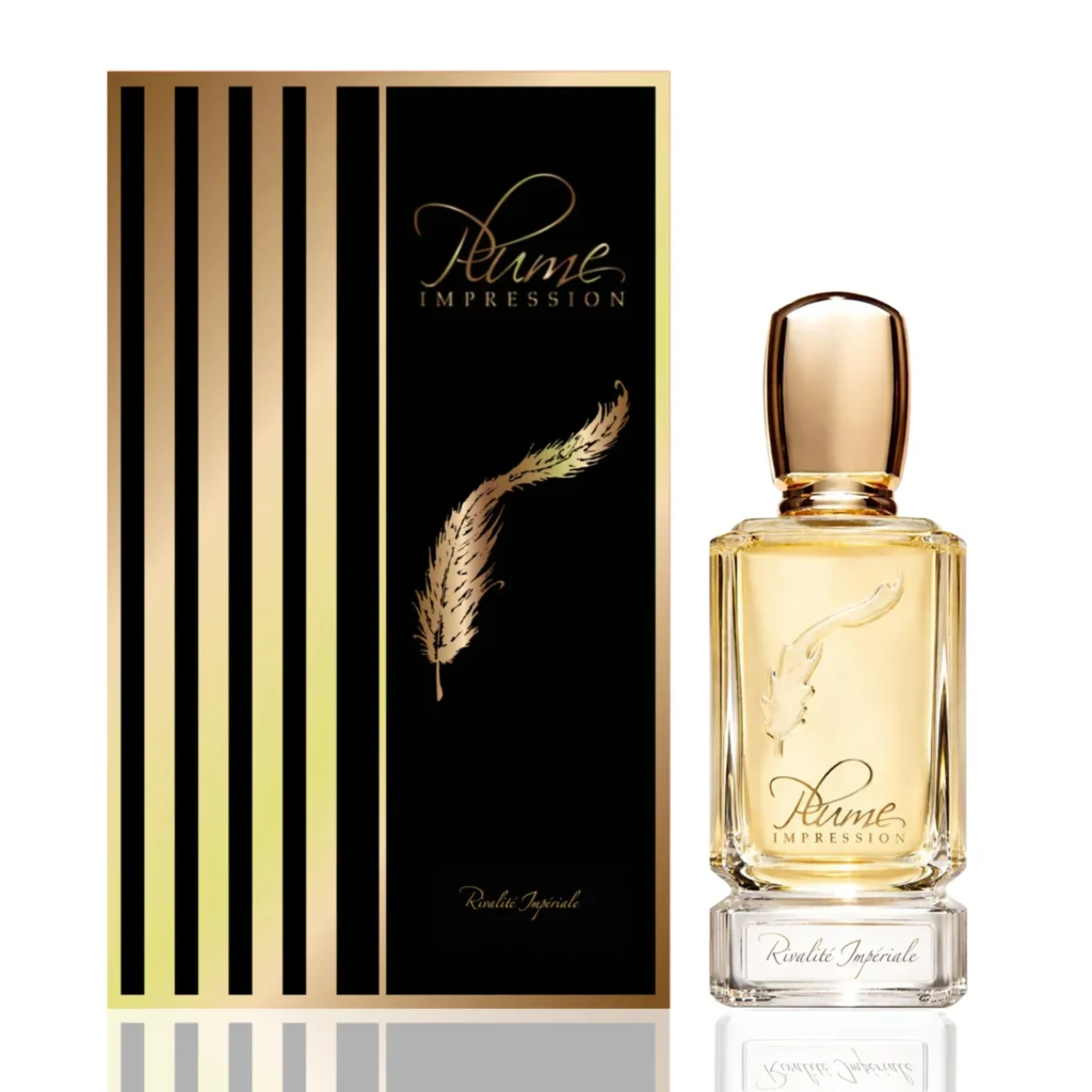 Plume Impression Rivalité Impériale perfume bottle beside its black and gold presentation box decorated with a golden feather motif.