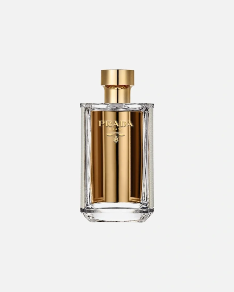 Prada La Femme Eau de Parfum bottle with a gold cap and ivory side panels