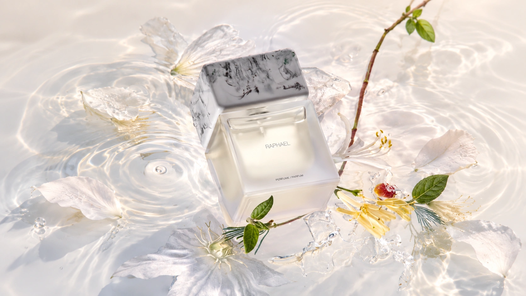 Sora Dora Raphael Extrait de Parfum bottle with a marble-effect cap surrounded by delicate white flowers, green leaves and shimmering water.
